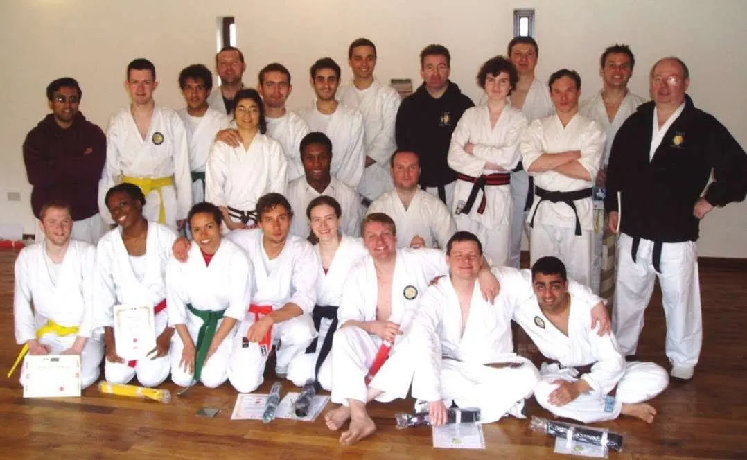 An early group photo of association members in gis